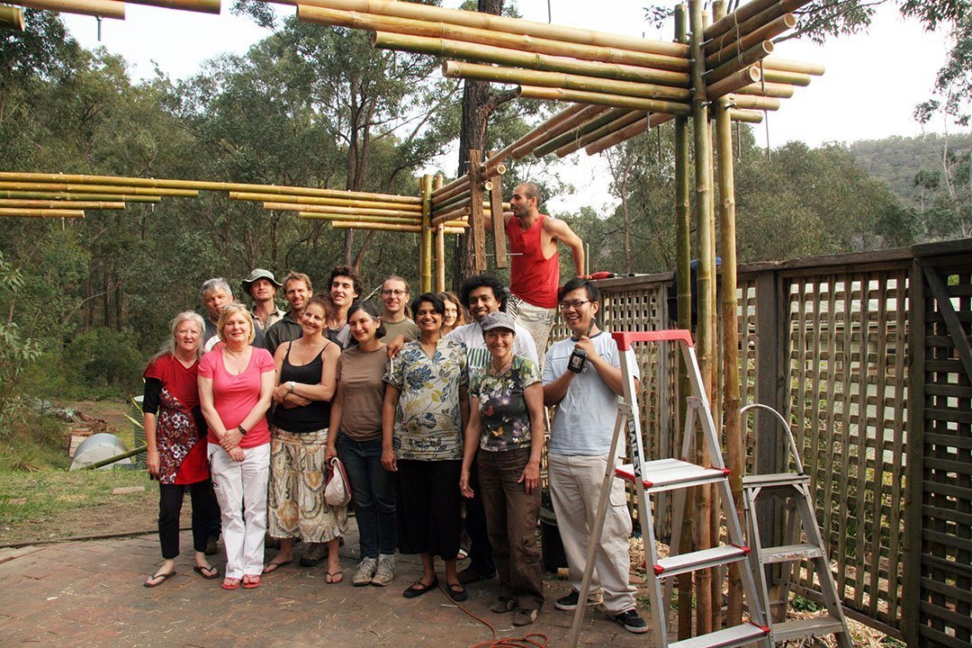 Satisfied and happy workshop participants who helped make the structure.